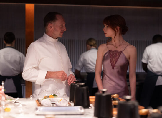Ralph Fiennes and Anya Taylor-Joy in the film THE MENU. Photo by Eric Zachanowich. Courtesy of Searchlight Pictures. © 2022 20th Century Studios All Rights Reserved